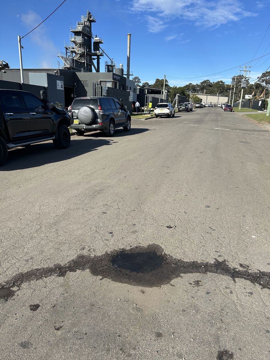 Completed Aqua Patch repairs along a road