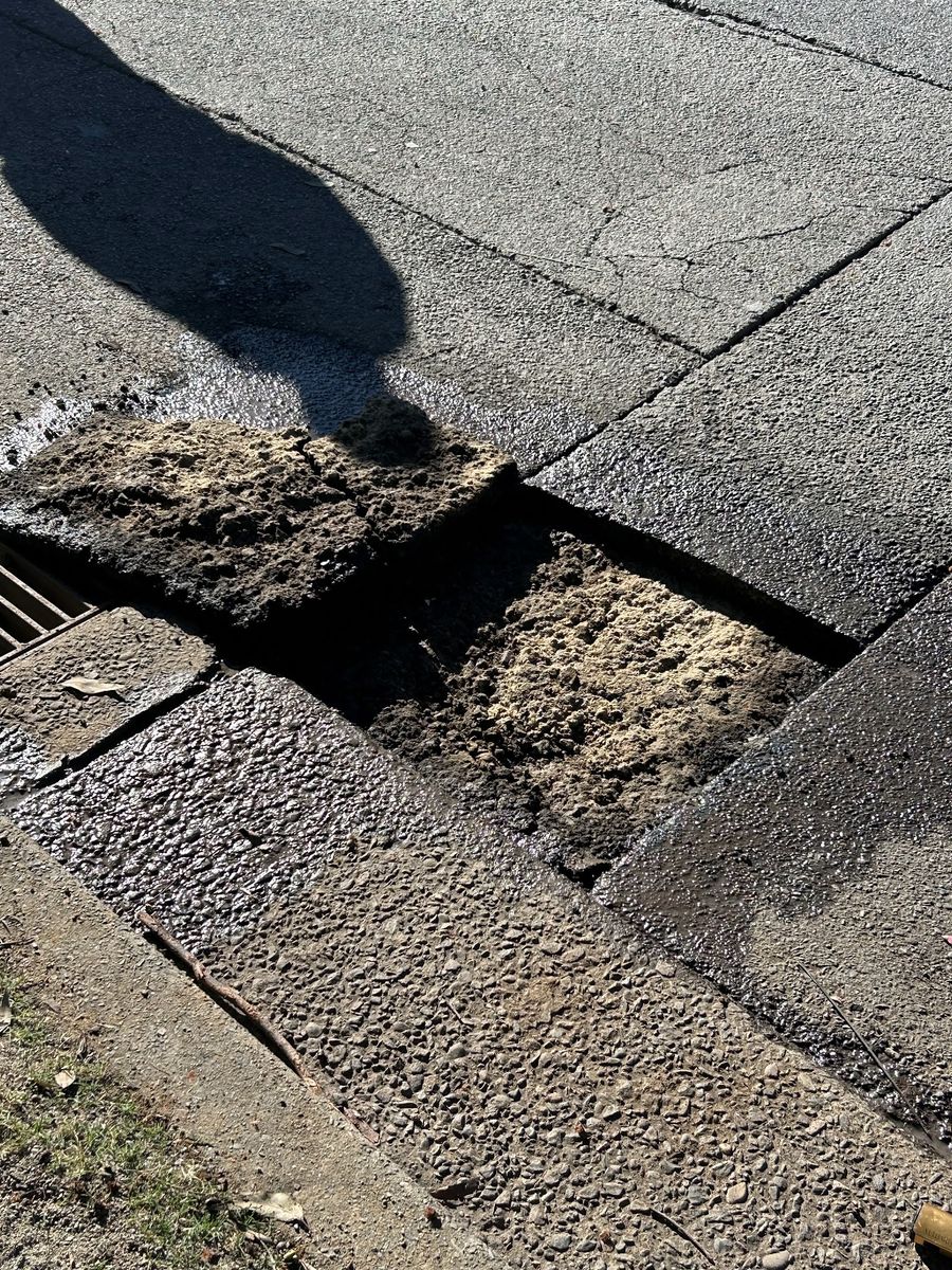 Close-up of a pothole repair